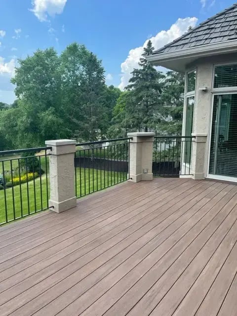 New deck and deck railing installed by Homecare Remodeling